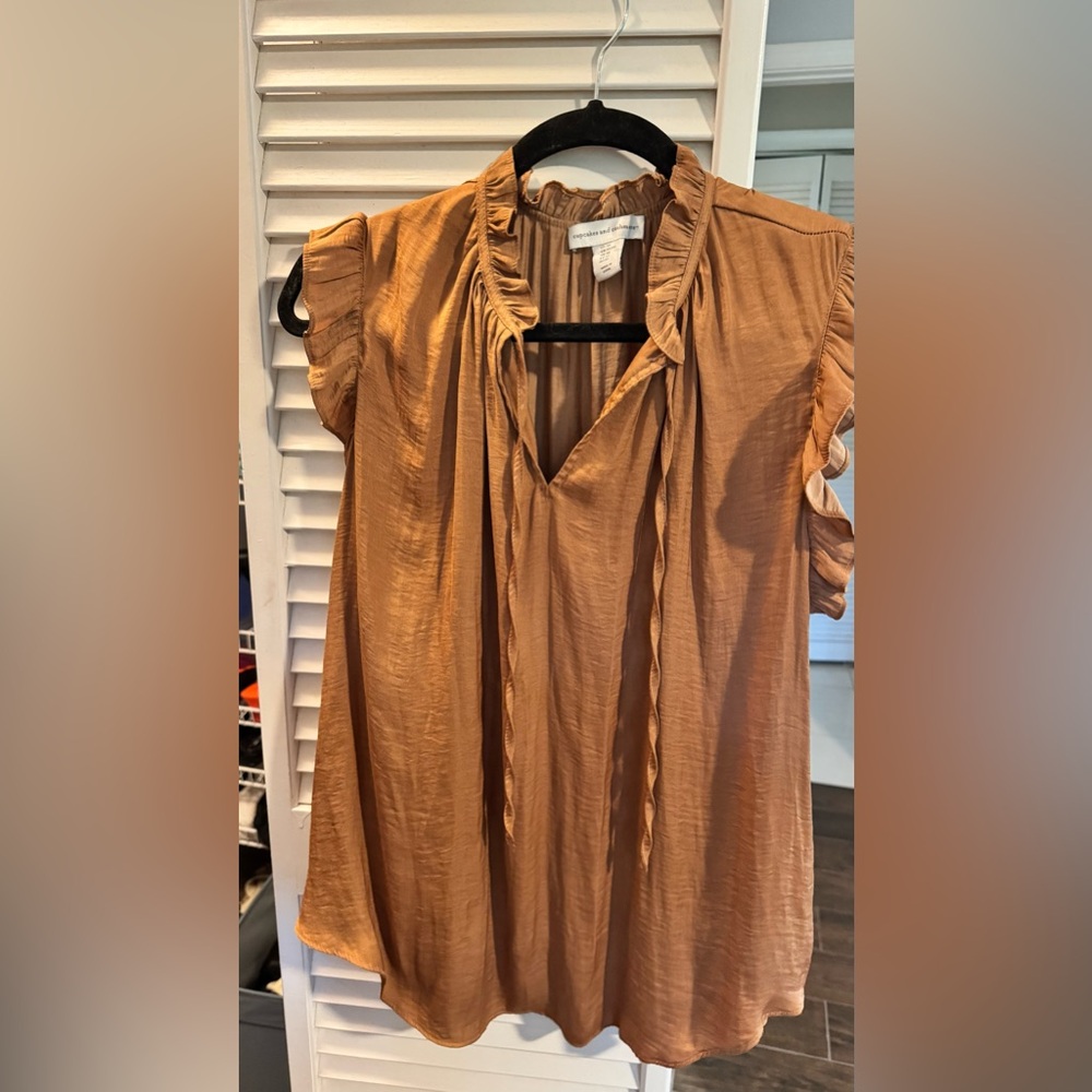 Cupcakes and cashmere blouse